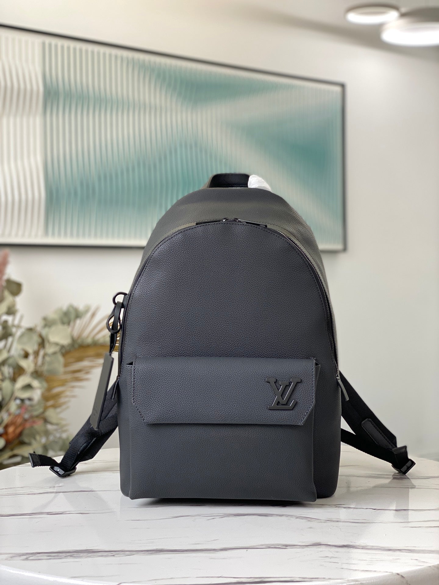 Louis Vuitton Luxury Matte Black Textured Leather Backpack with Pocket