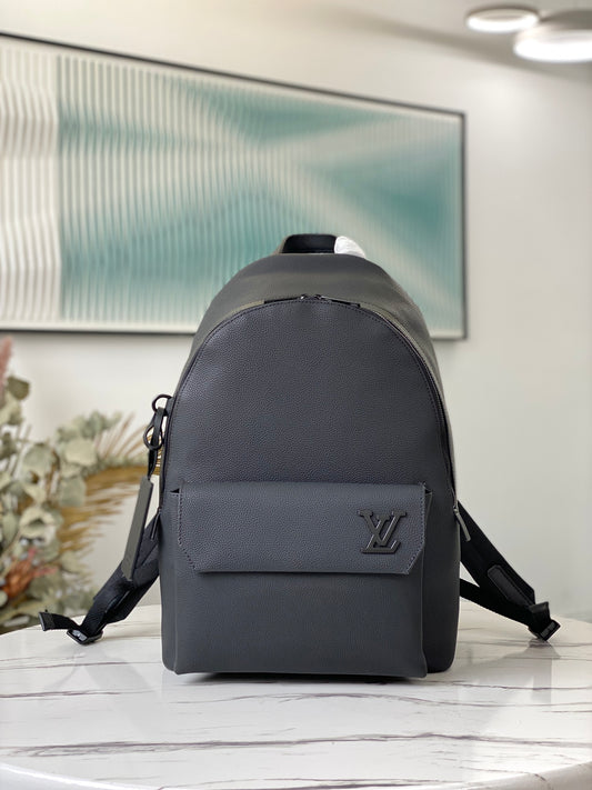Louis Vuitton Luxury Matte Black Textured Leather Backpack with Pocket