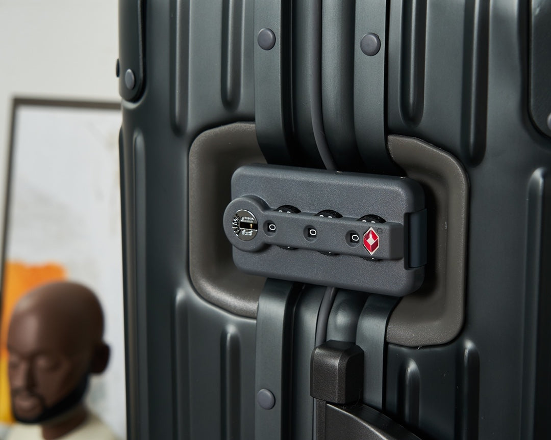 Sleek Black Ribbed Hardshell Carry-On Suitcase with Spinner Wheels