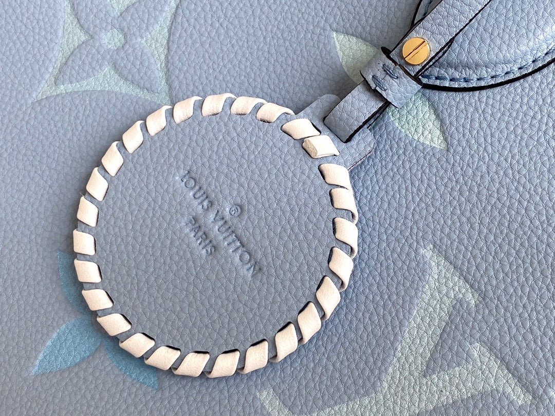 Louis Vuitton OnTheGo MM Monogram Empreinte Leather Tote Bag - Light Blue