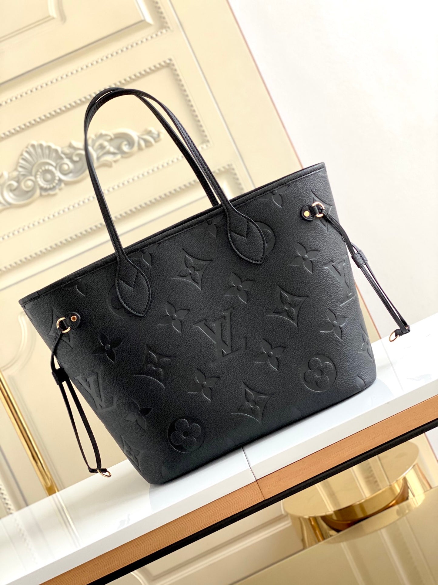 Louis Vuitton Elegant Black Embossed Leather Tote Bag with Double Handles