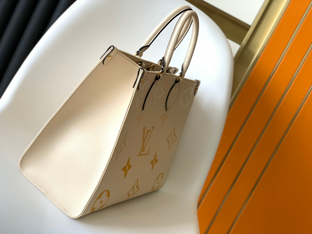 Louis Vuitton Luxury Beige Leather Tote Bag with Gold Monogram Floral Pattern