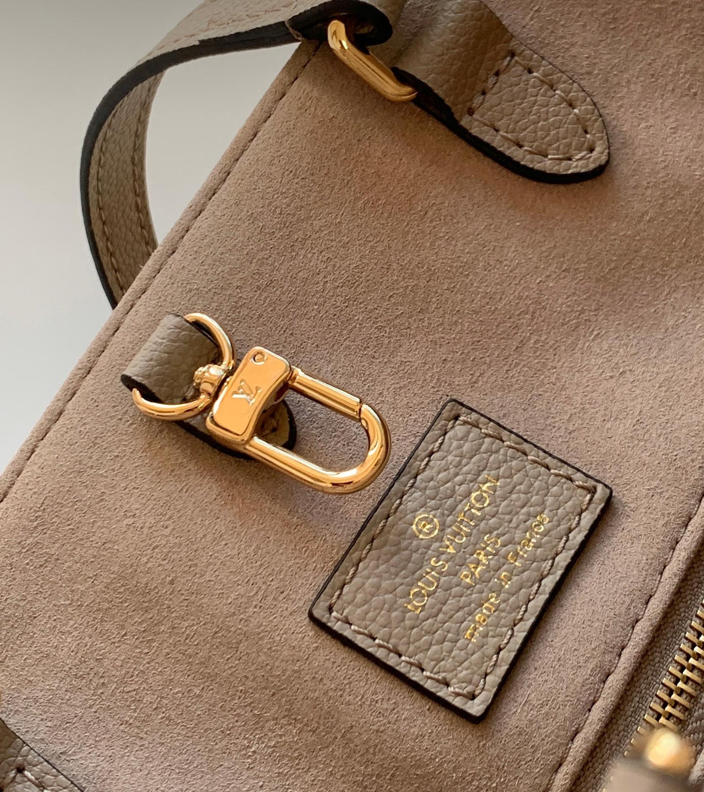 Louis Vuitton Elegant Taupe Leather Tote Bag with Large Embossed Monogram