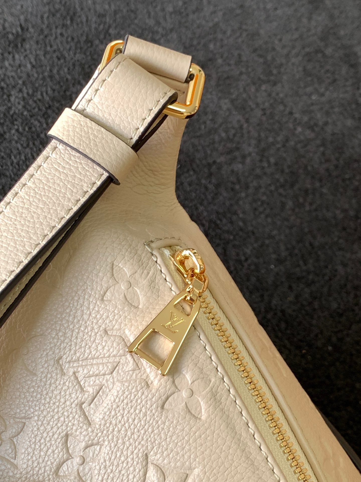 Louis Vuitton Luxury Off-White Embossed Leather Belt Bag with Gold Hardware