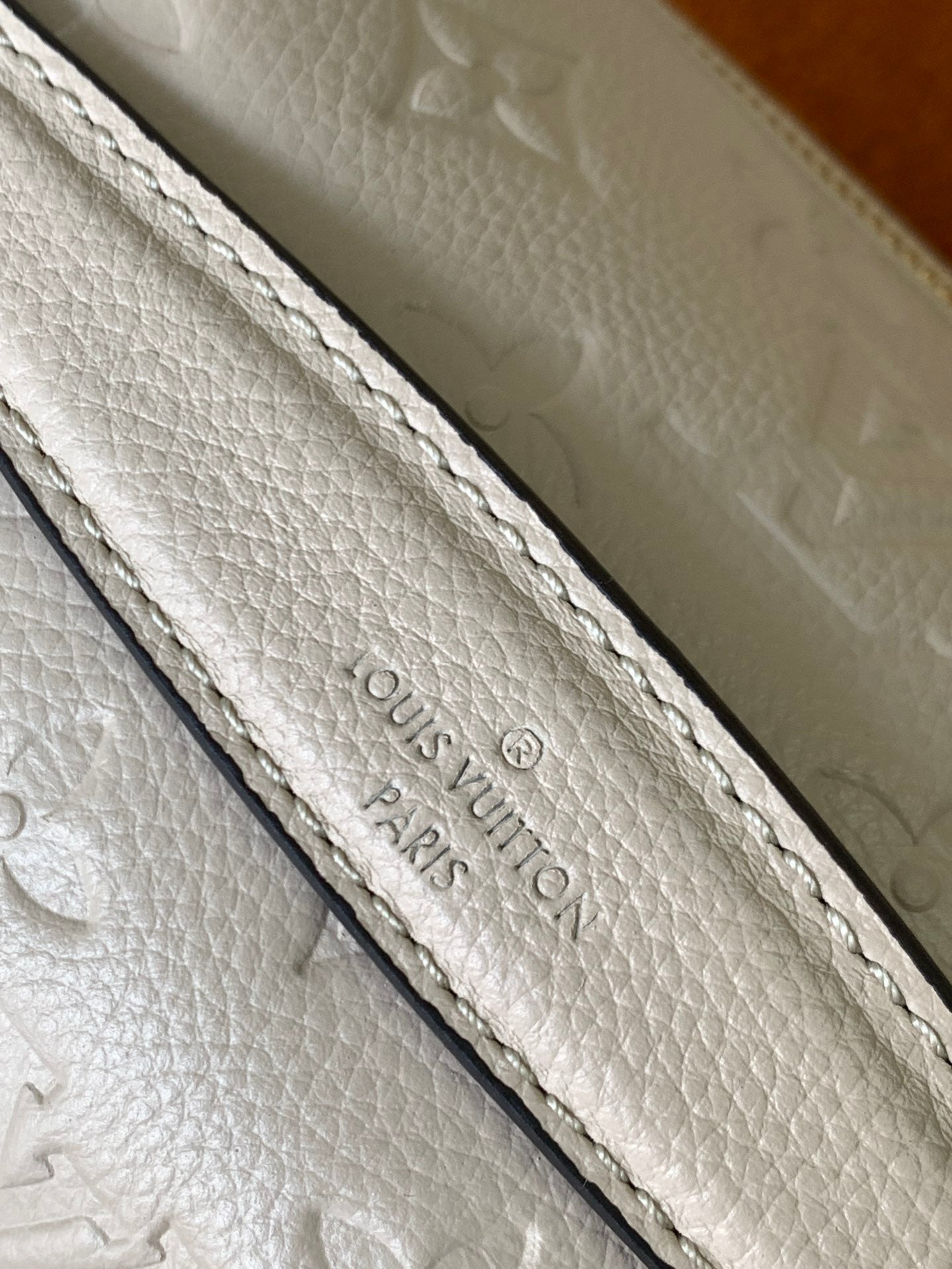 Louis Vuitton Luxury Off-White Embossed Leather Belt Bag with Gold Hardware