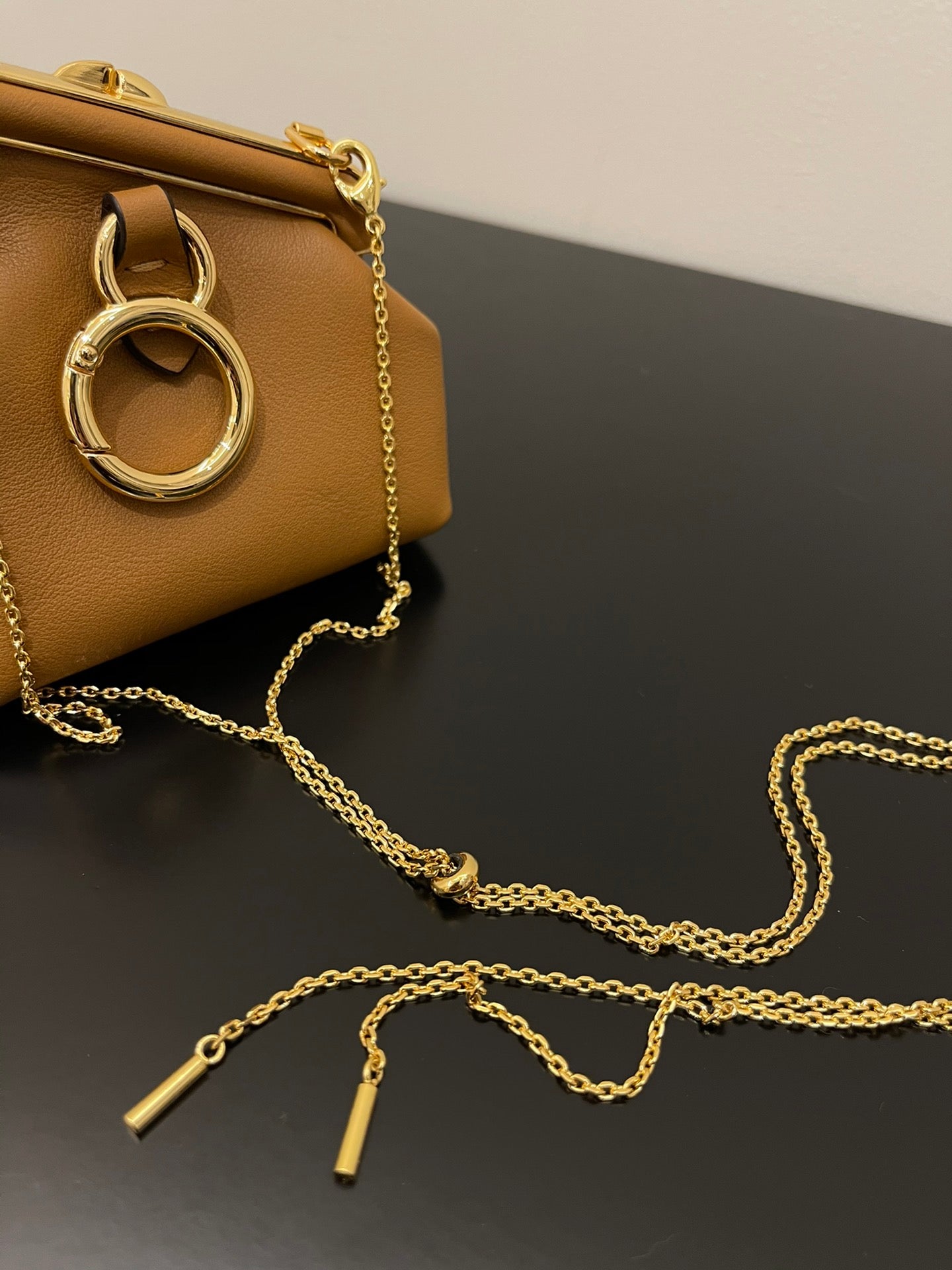 Mini Tan Leather Pouch Bag with Gold Chain Strap