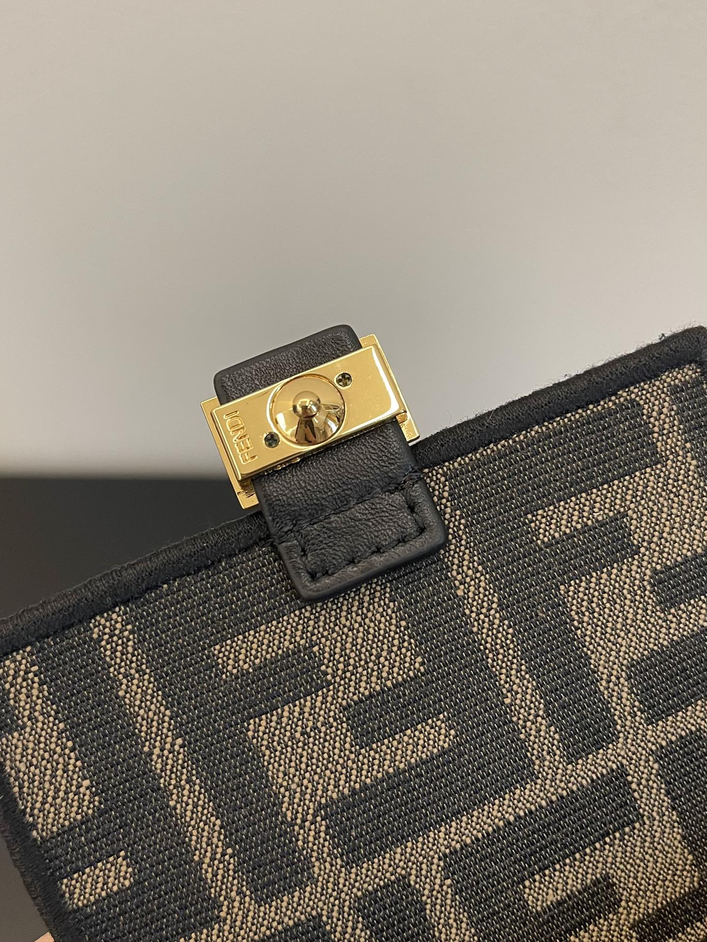 Fendi FF Canvas Nano Baguette Charm with Gold-Tone Ring Handle