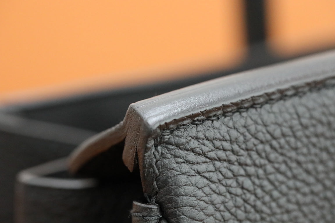 Luxury Black Leather Top Handle Handbag with Gold-Tone Hardware