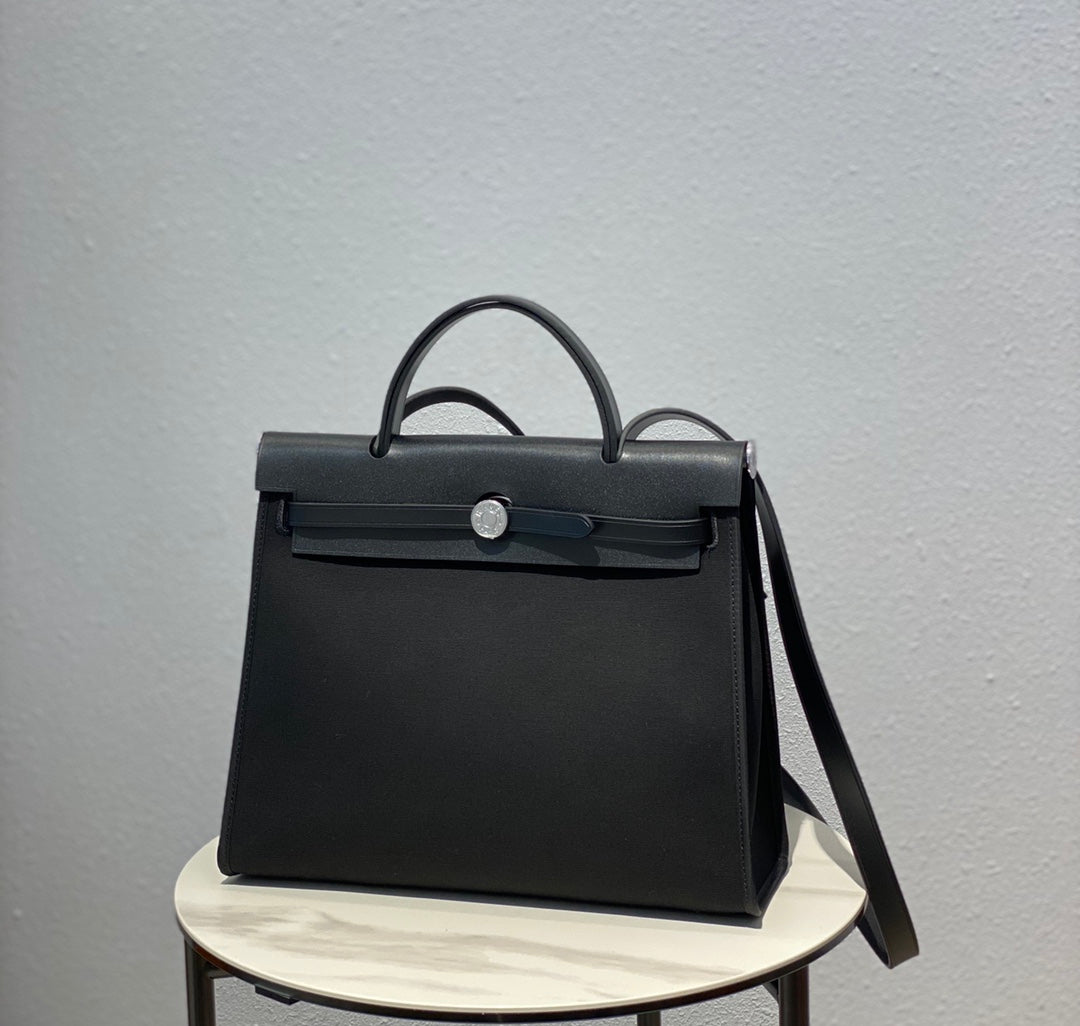 Elegant Black Structured Top-Handle Handbag - Versatile Satchel with Shoulder Strap