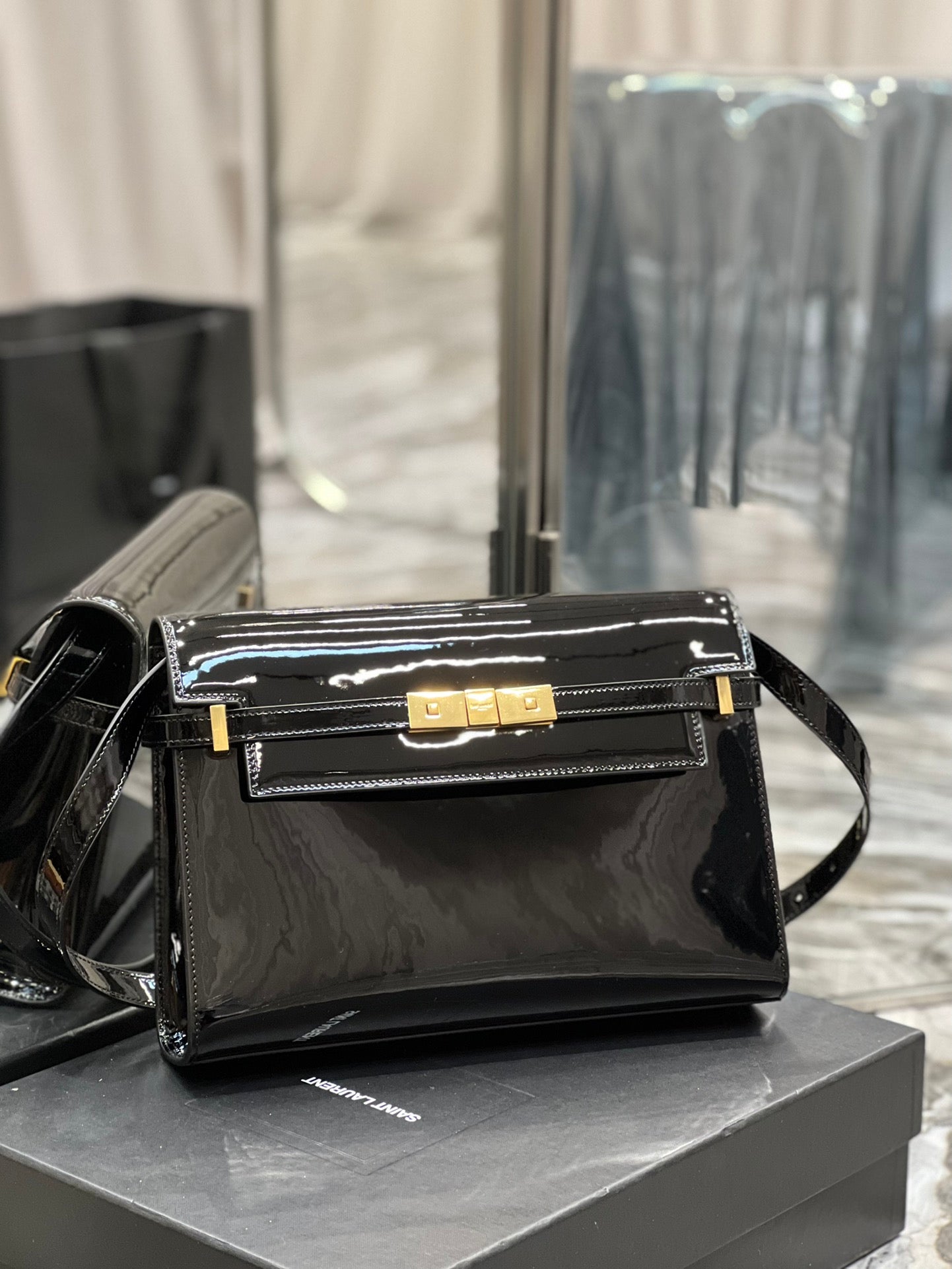 Elegant Black Patent Leather Handbag with Gold Clasp - Luxury Shoulder Bag
