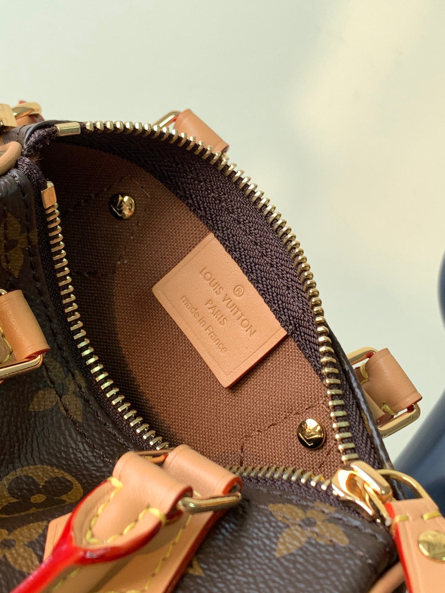 Louis Vuitton Classic Brown Monogram Mini Barrel Handbag with Leather Strap