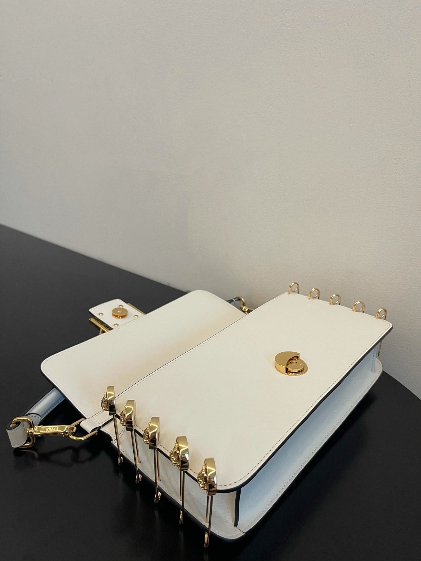 Fendi White Leather Baguette Bag with Gold-Tone Hardware and Detachable Strap