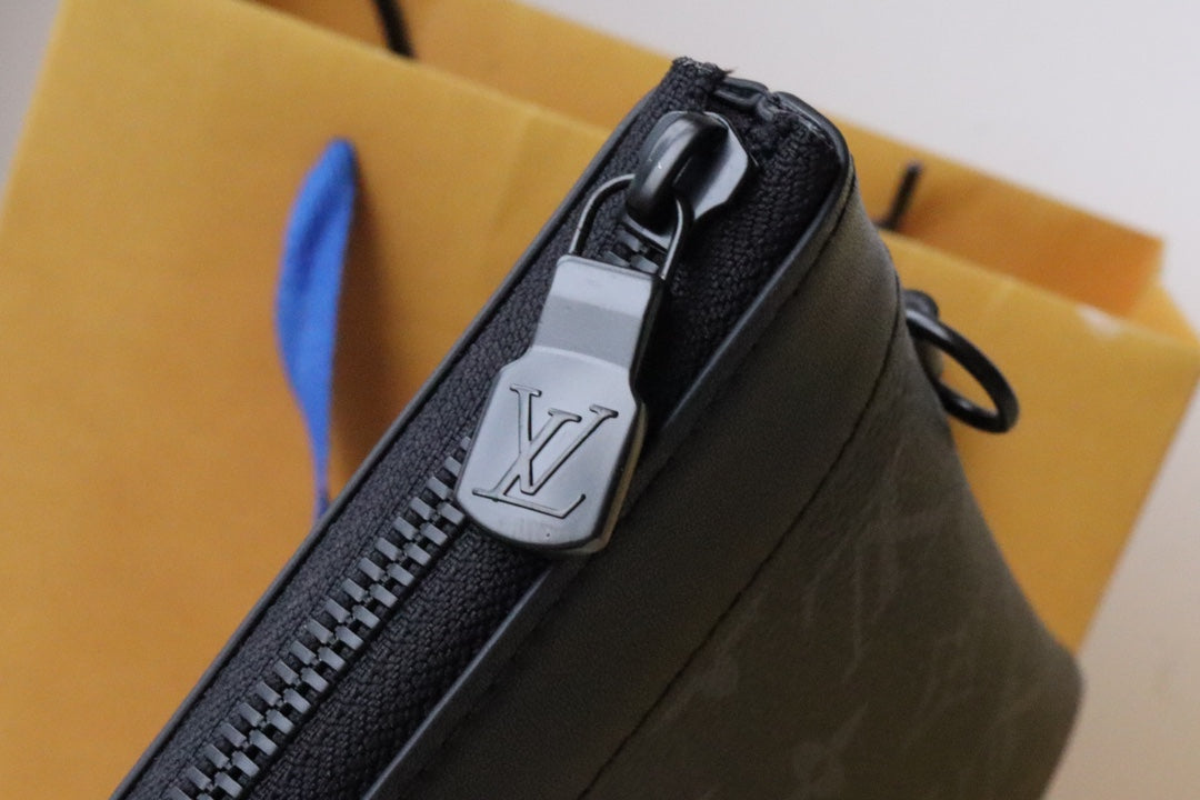 Louis Vuitton Pochette Voyage MM Monogram Eclipse Canvas Clutch Bag