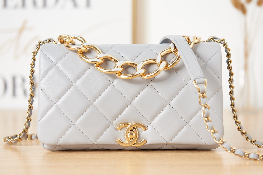 Light Blue Quilted Shoulder Bag with Gold Chain Strap and Chunky Link Hardware