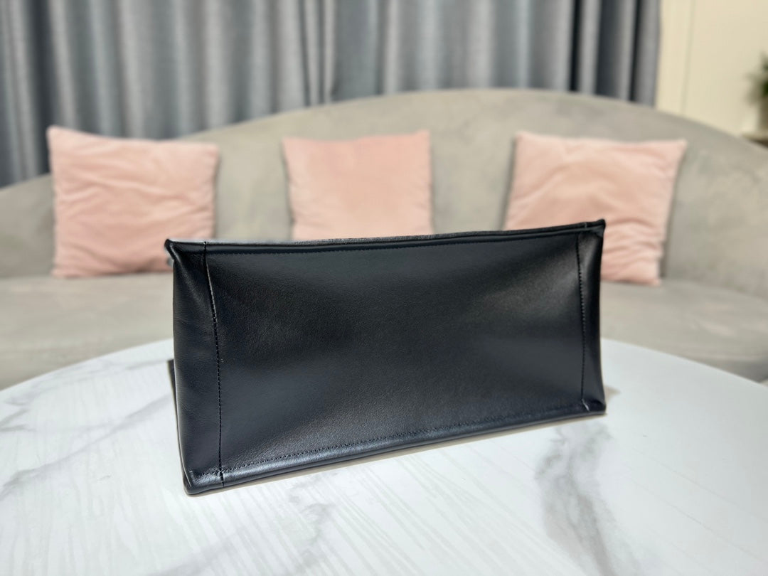 Dior Elegant Black Quilted Leather Tote Handbag with Top Handles