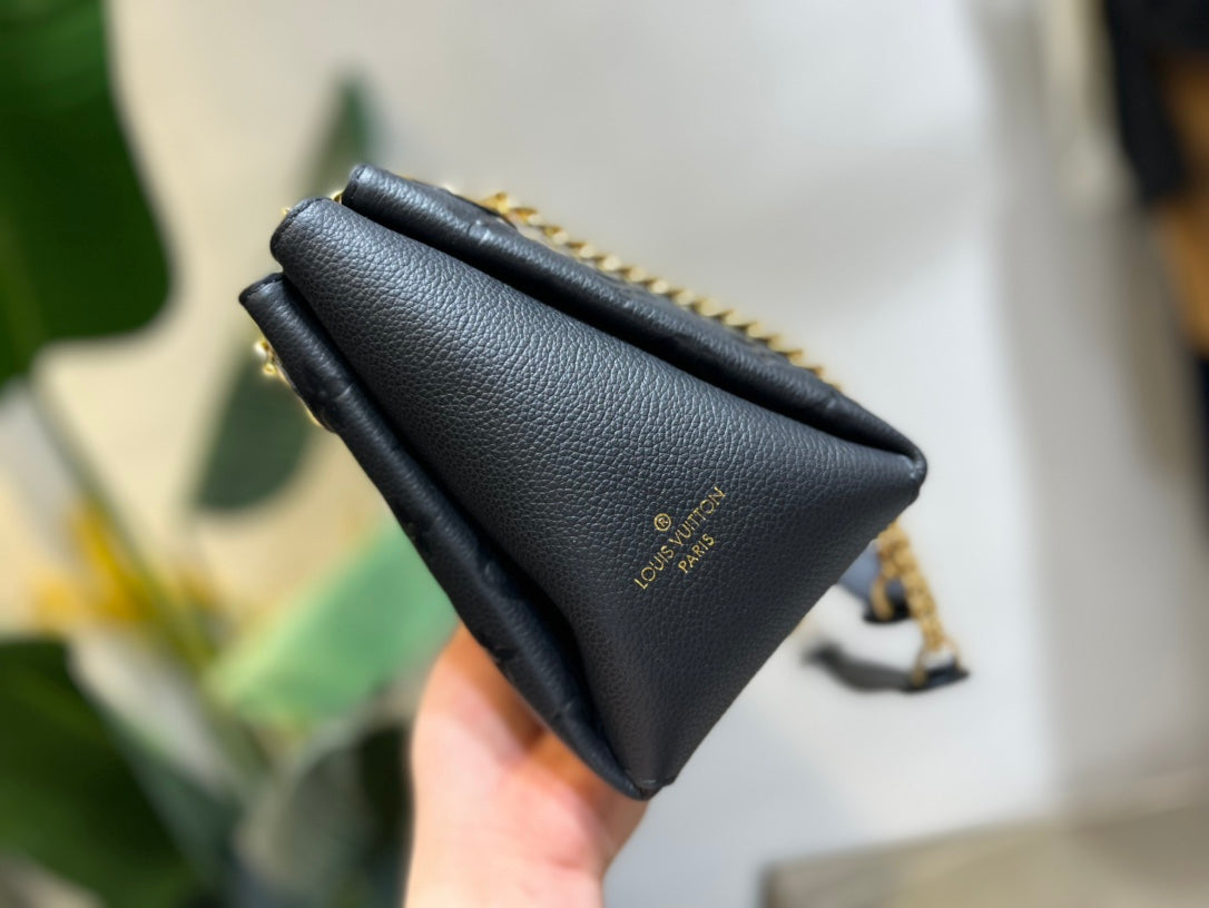 Louis Vuitton Elegant Black Embossed Shoulder Bag with Gold Chain Strap