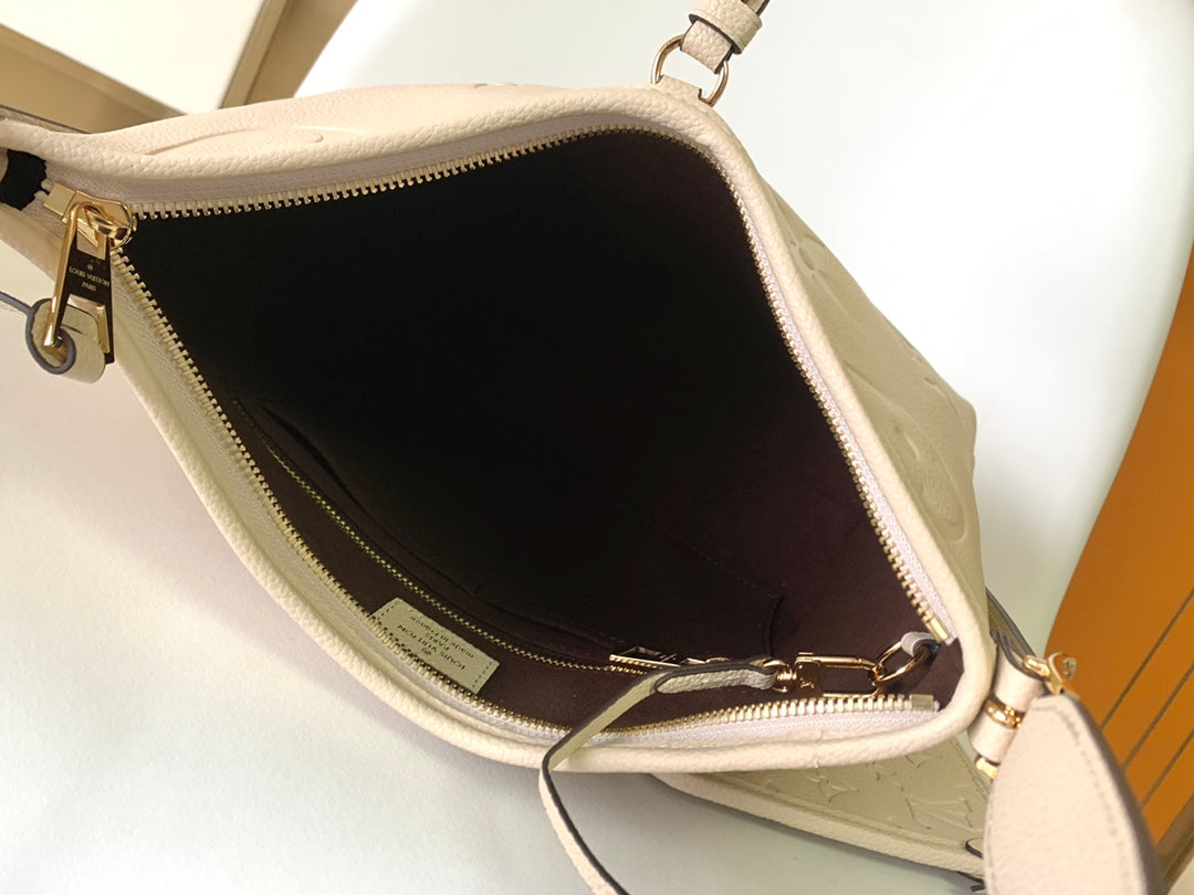Louis Vuitton Elegant Beige Embossed Leather Shoulder Bag with Hanging Tag