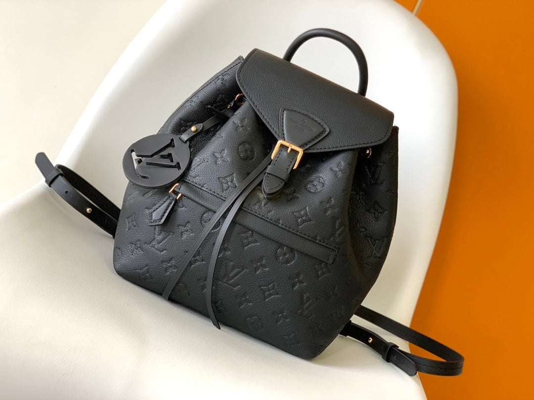 Louis Vuitton Elegant Black Embossed Leather Small Backpack with Flap Closure