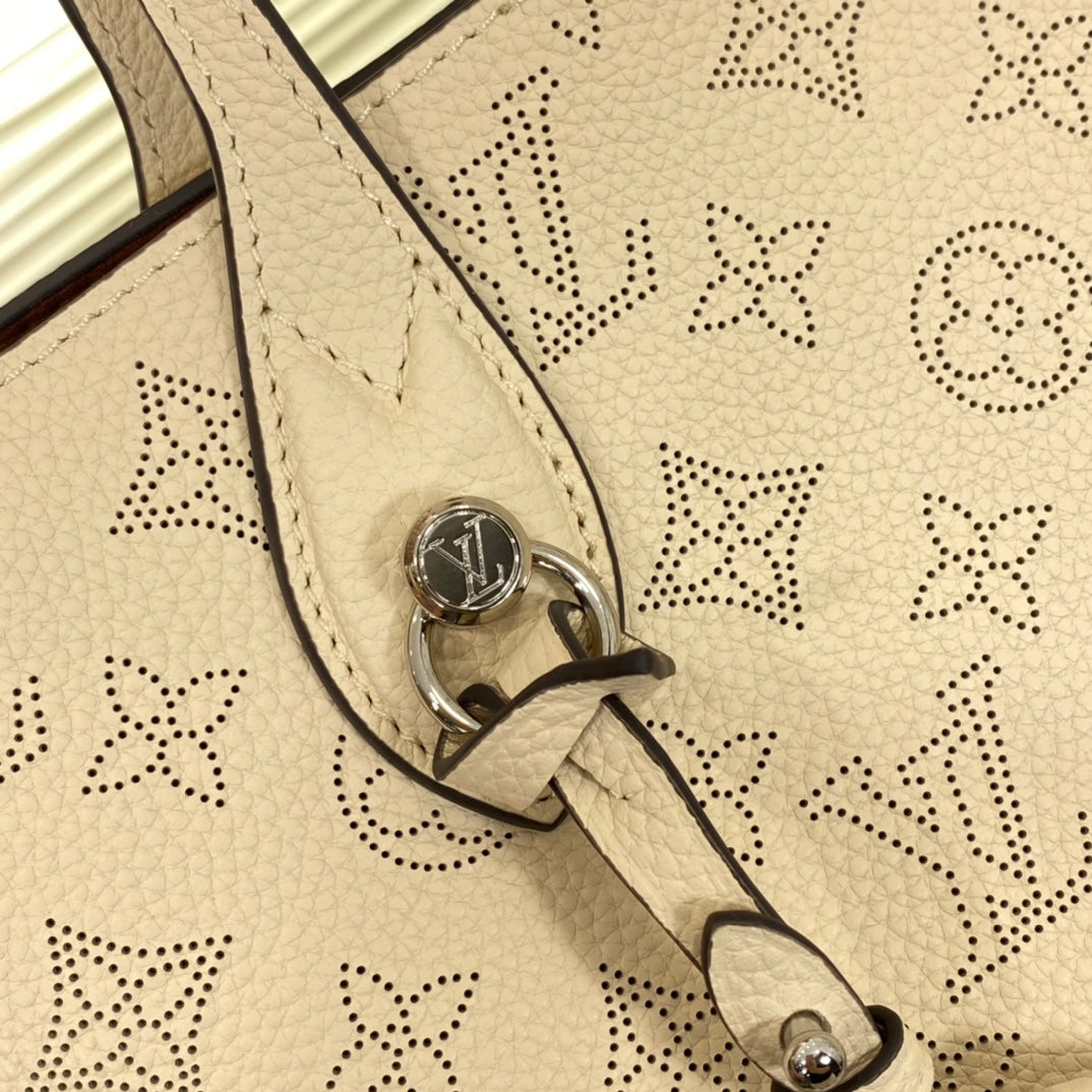 Louis Vuitton Luxury Cream Perforated Leather Tote Bag with Round Charm