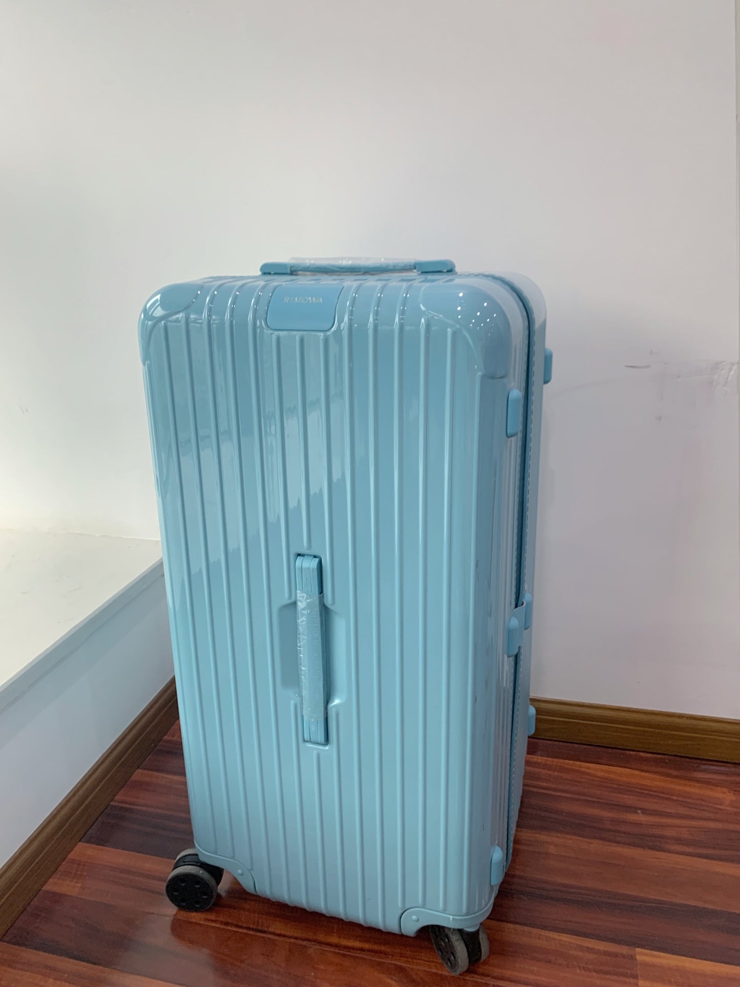 Light Blue Vertical Striped Hardside Spinner Trunk Suitcase