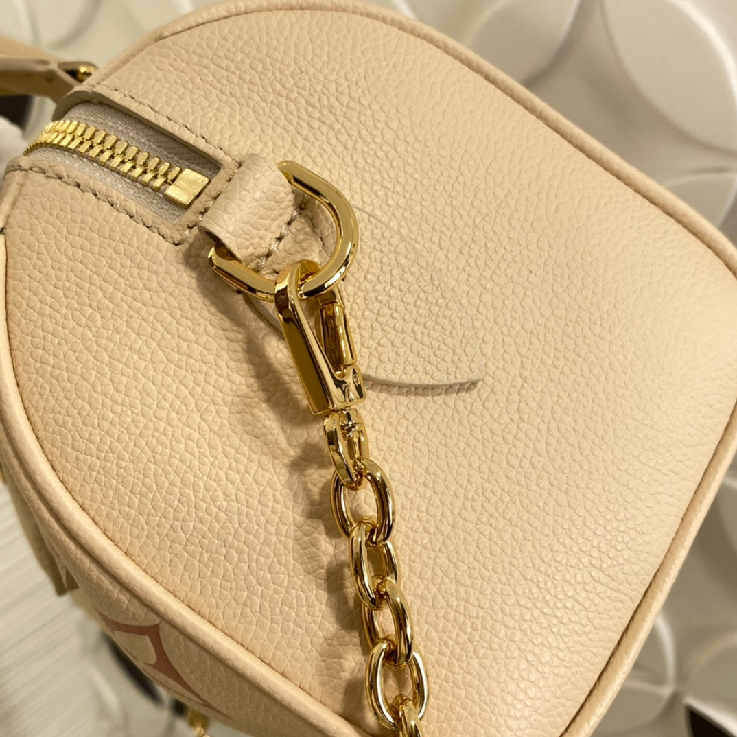 Louis Vuitton Cream and Pink Monogram Embossed Leather Mini Duffle Handbag