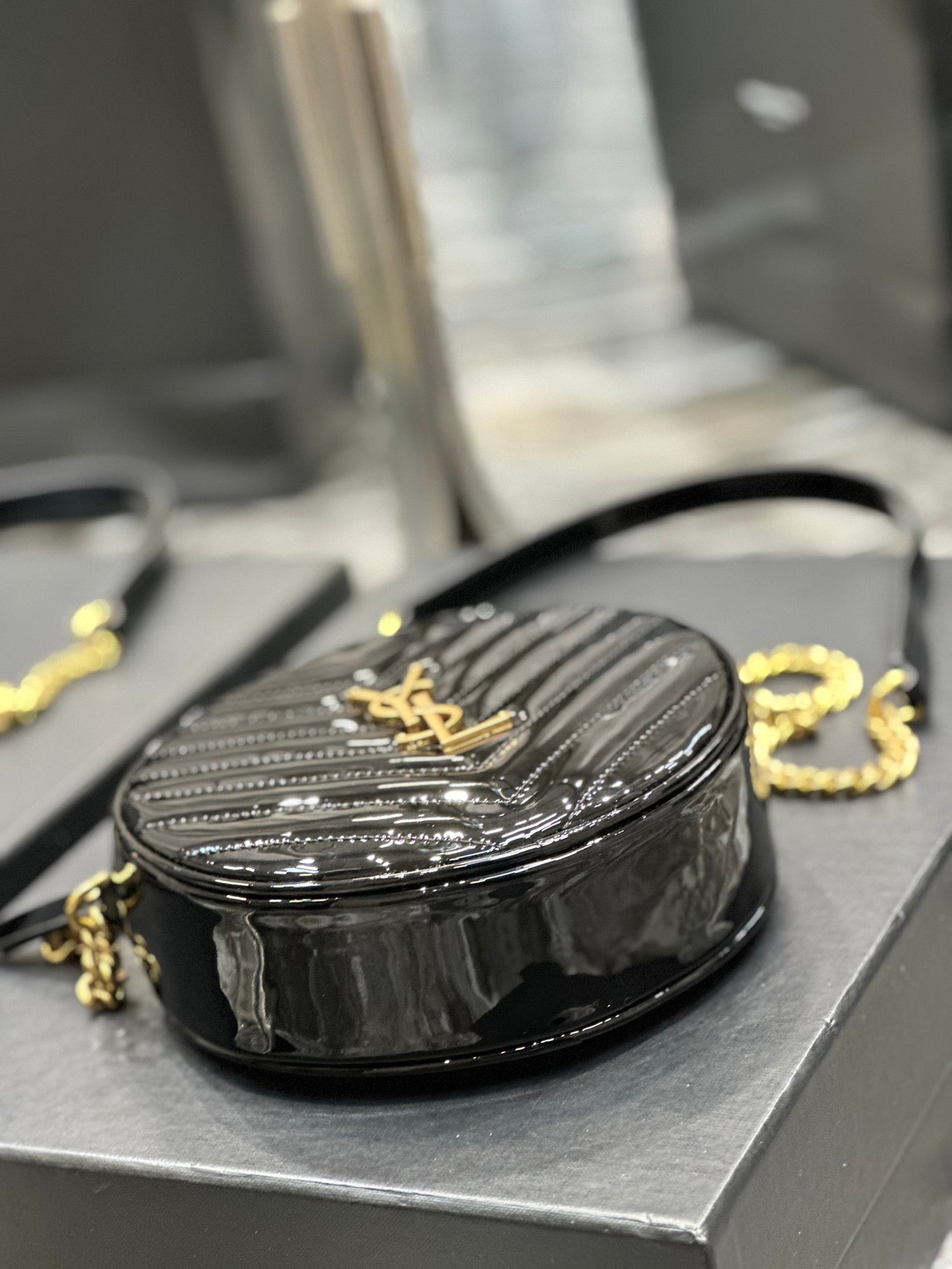 Saint Laurent Vinyle Round Camera Bag in Chevron-Quilted Leather - Black