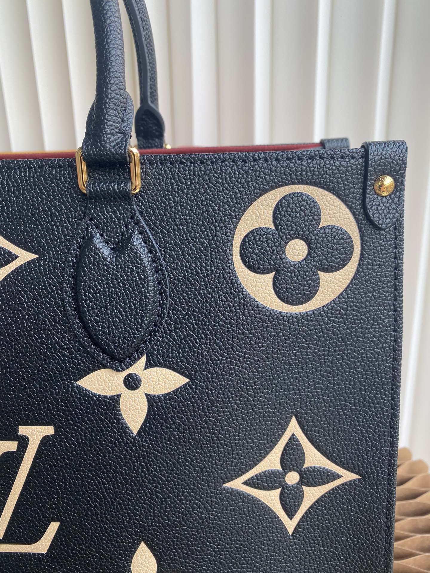 Louis Vuitton Luxury Black Leather Tote Bag with Gold Monogram Pattern