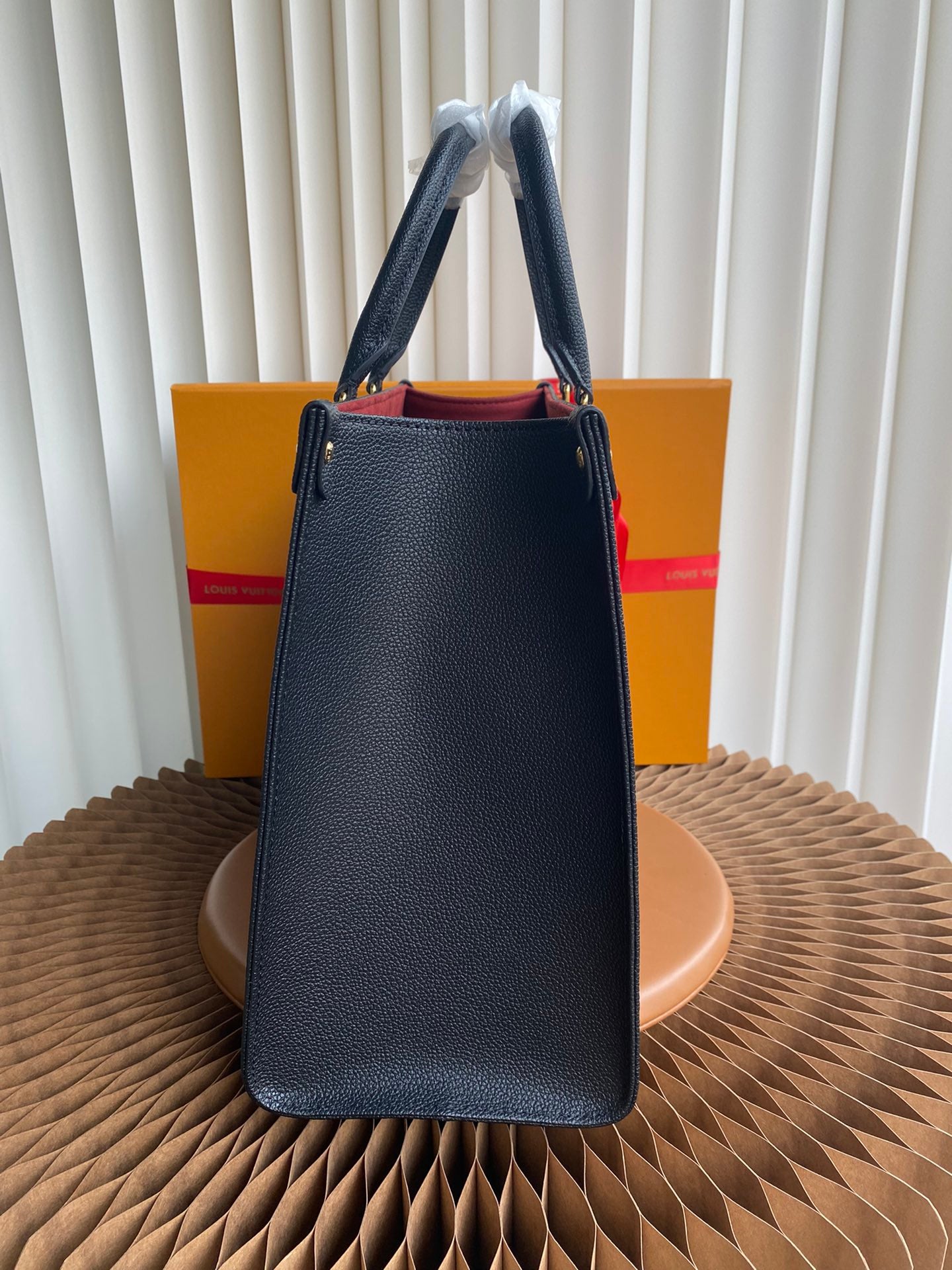 Louis Vuitton Luxury Black Leather Tote Bag with Gold Monogram Pattern
