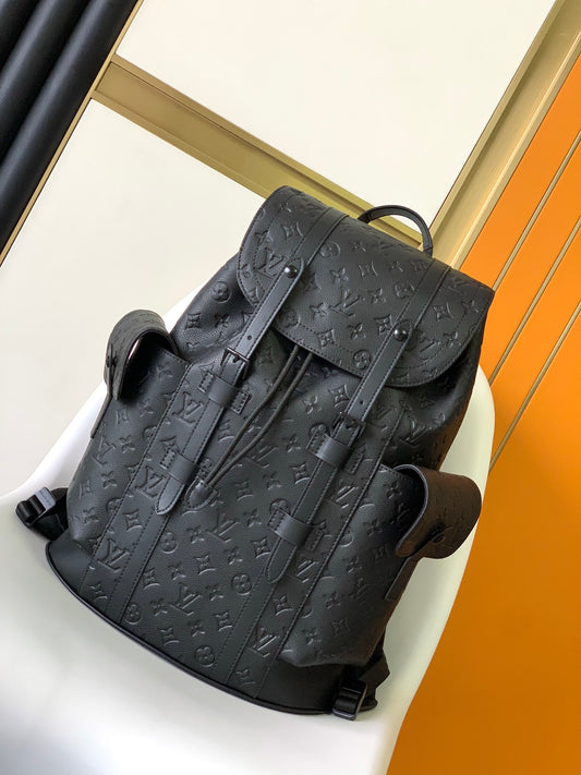 Louis Vuitton Luxury Black Embossed Leather Backpack with Side Pockets