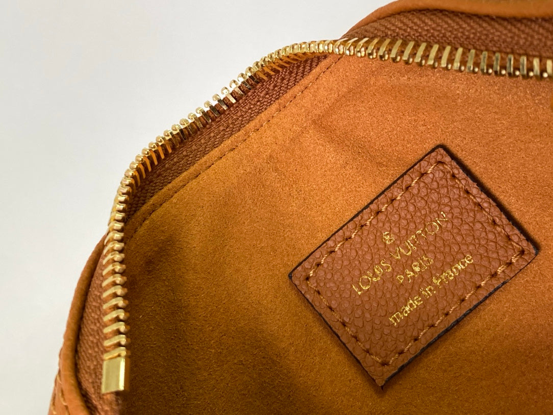 Louis Vuitton Classic Tan Monogram Mini Duffle Handbag with Adjustable Shoulder Strap
