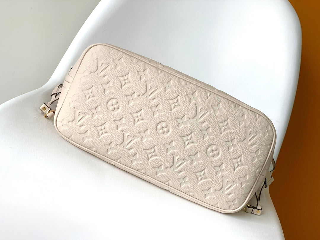 Louis Vuitton Elegant Beige Embossed Leather Tote Bag with Side Drawstrings