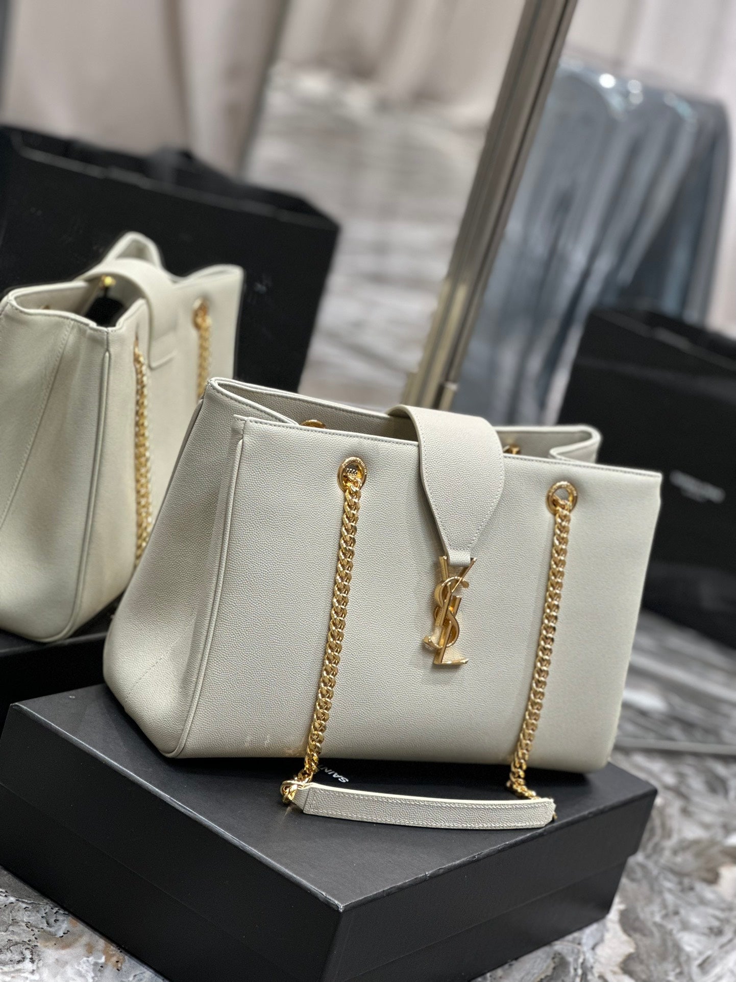 Luxury Off-White Leather Shoulder Bag with Gold Chain and Tassel