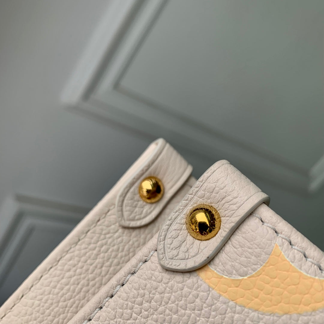Louis Vuitton Cream and Orange Monogram Top Handle Leather Tote Bag