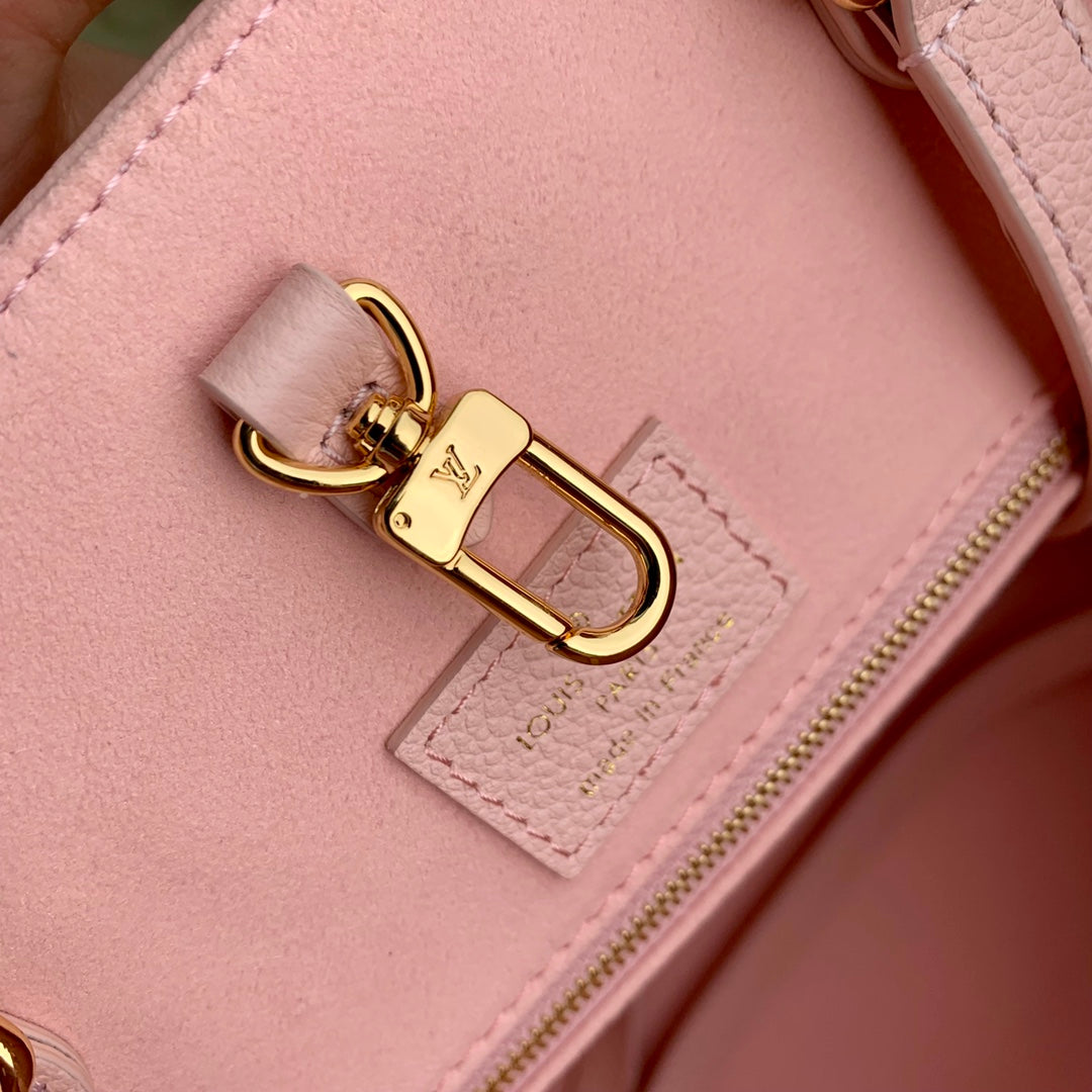 Louis Vuitton Elegant Pastel Pink Monogram Pattern Top Handle Tote Bag