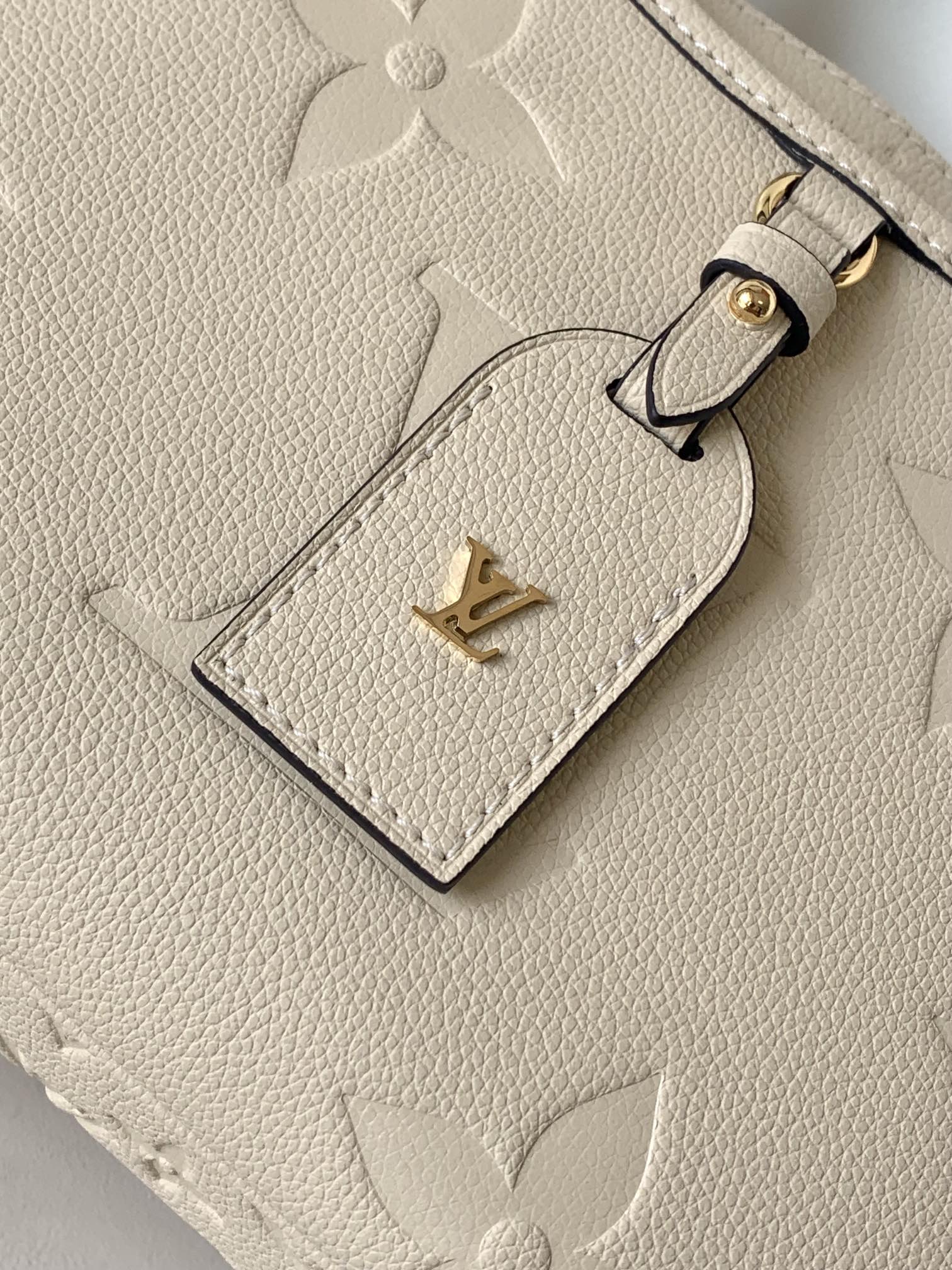 Louis Vuitton Classic Cream Embossed Textured Leather Top Handle Handbag