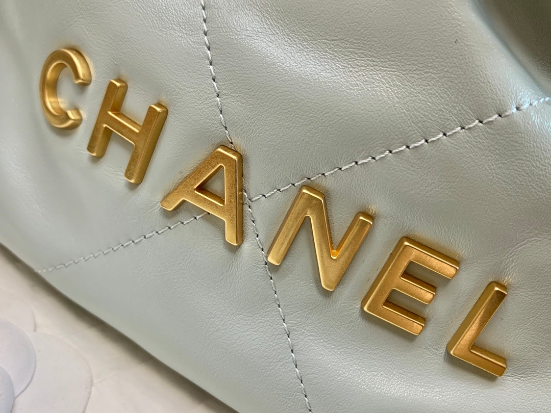 Chanel Mini Drawstring Pouch Bag with Gold-Tone Chain and Coin Charm - Mint Green