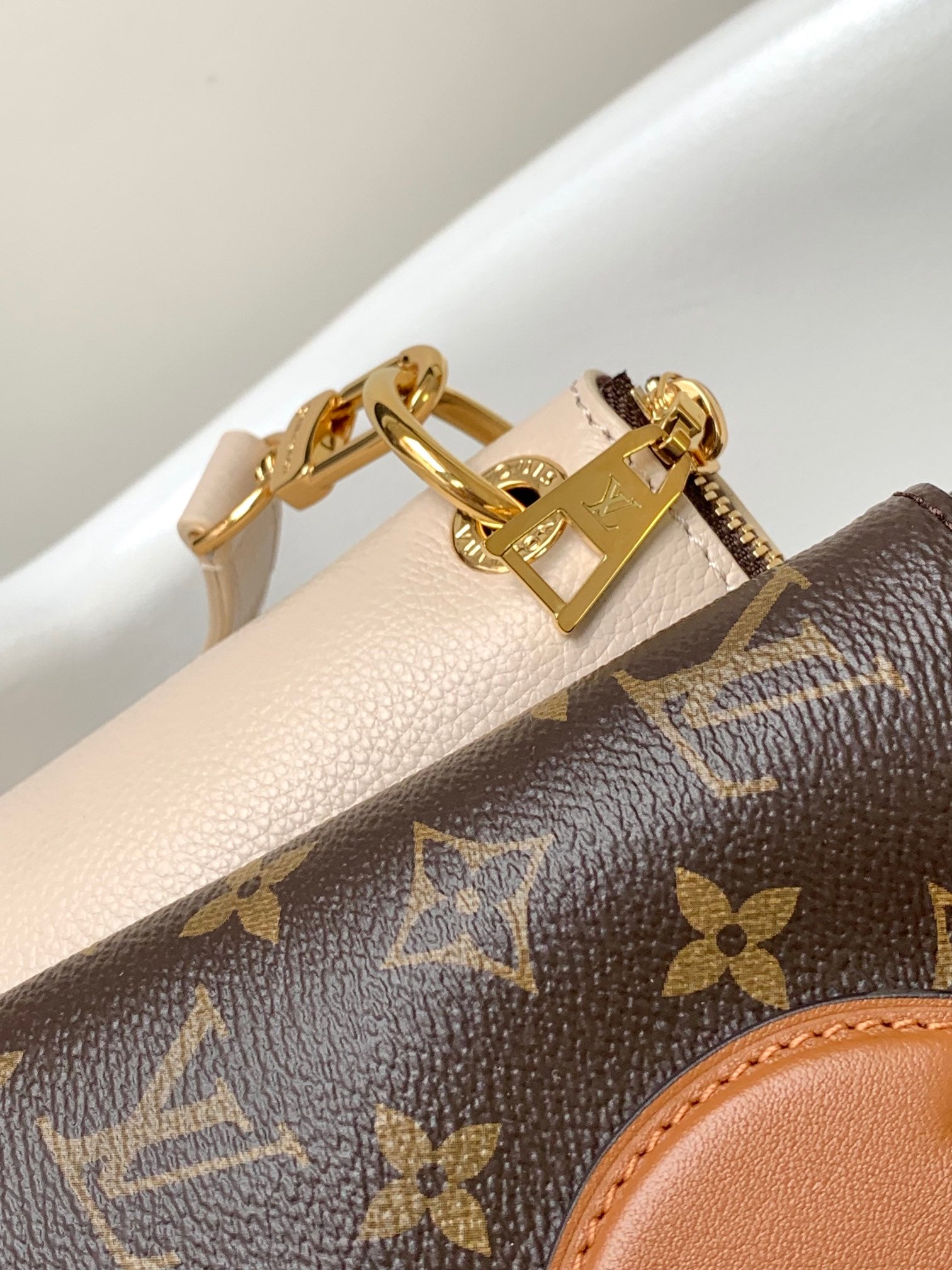 Louis Vuitton Classic Monogram Canvas Handbag with Leather Trim and Top Handles