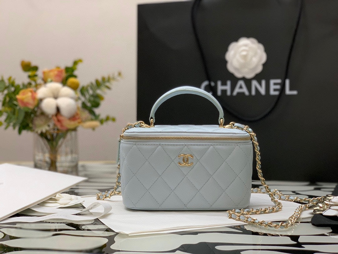 Chanel Quilted Light Blue Vanity Bag with Top Handle and Gold-Tone Hardware