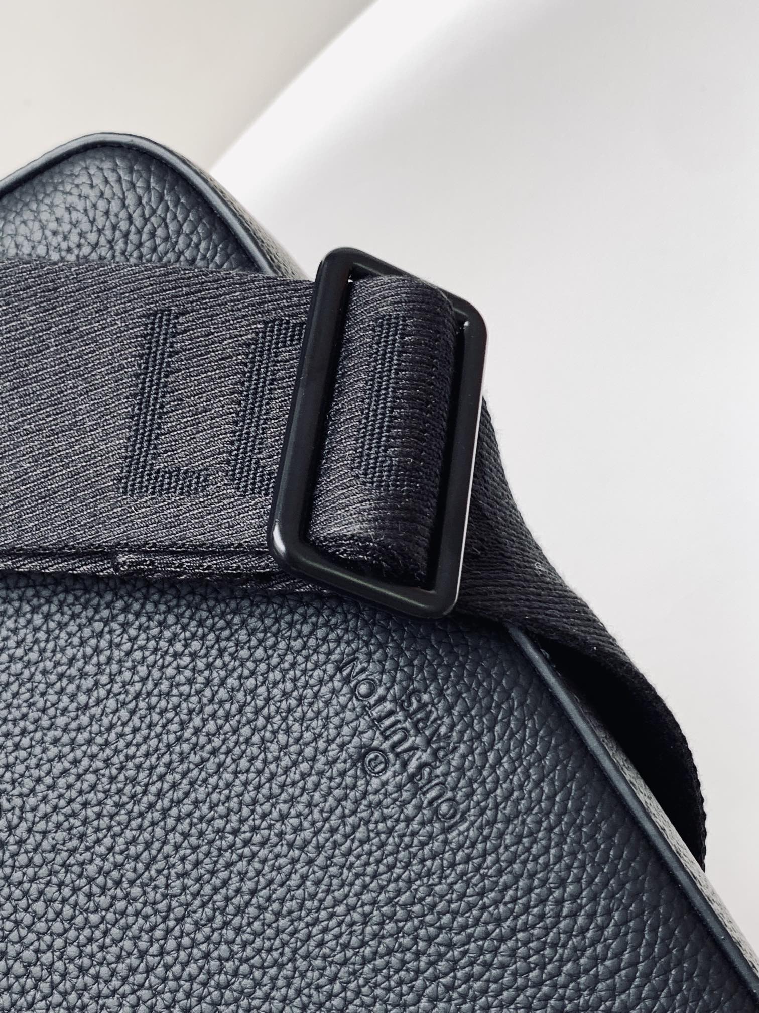 Louis Vuitton Minimalist Black Leather Crossbody Bag with Wide Adjustable Strap