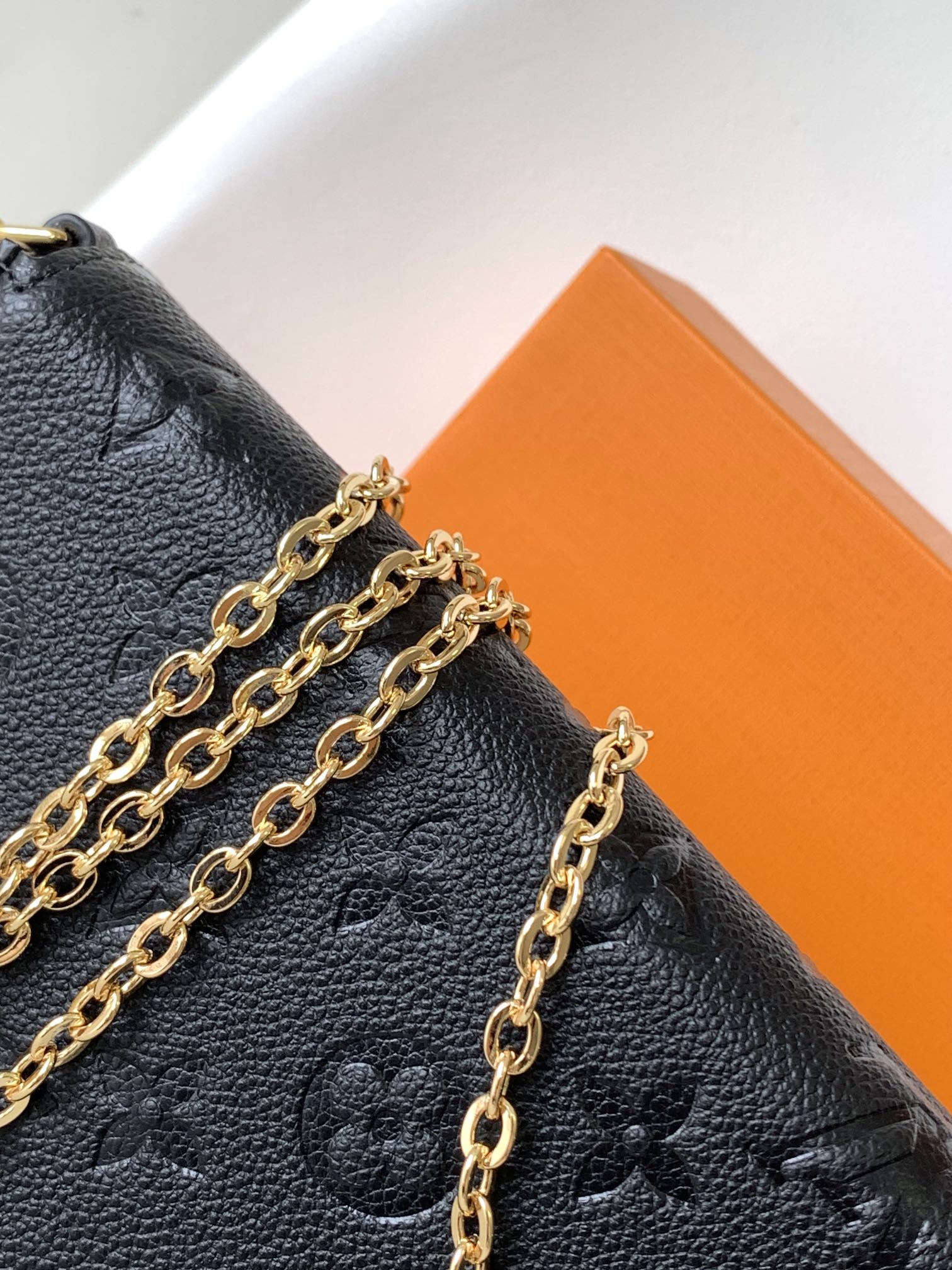 Louis Vuitton Black Monogram Embossed Leather Crossbody Clutch Bag with Gold Chain