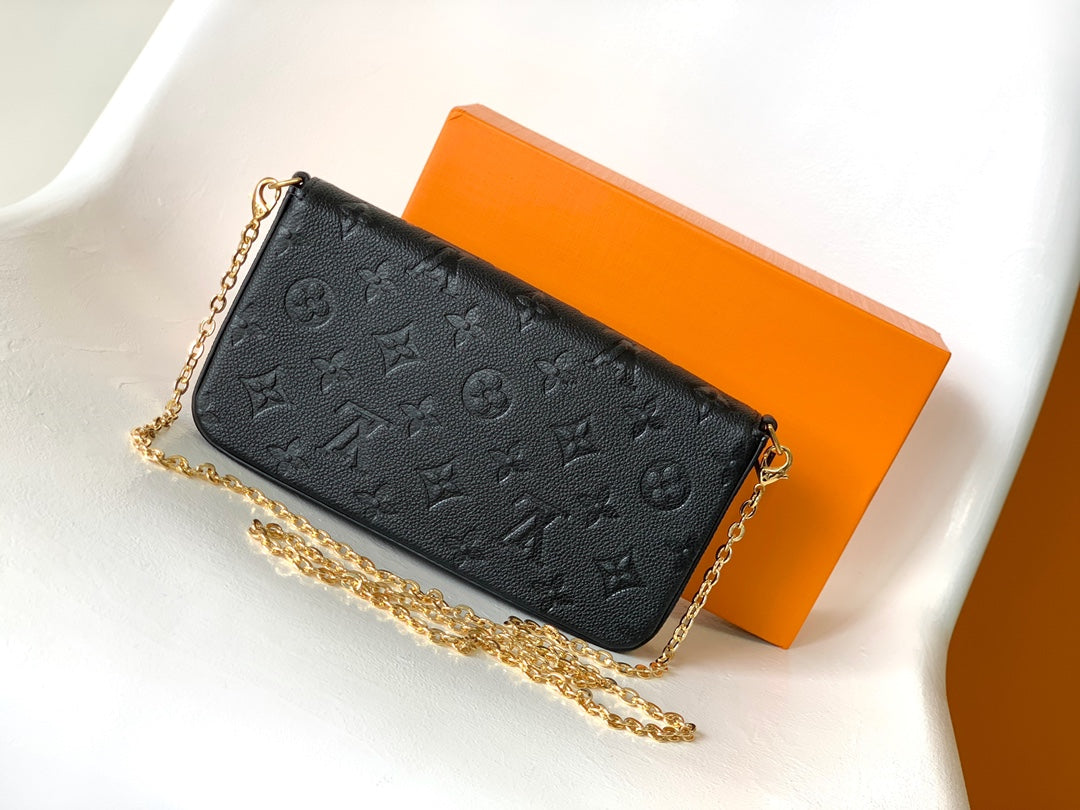 Louis Vuitton Black Monogram Embossed Leather Crossbody Clutch Bag with Gold Chain