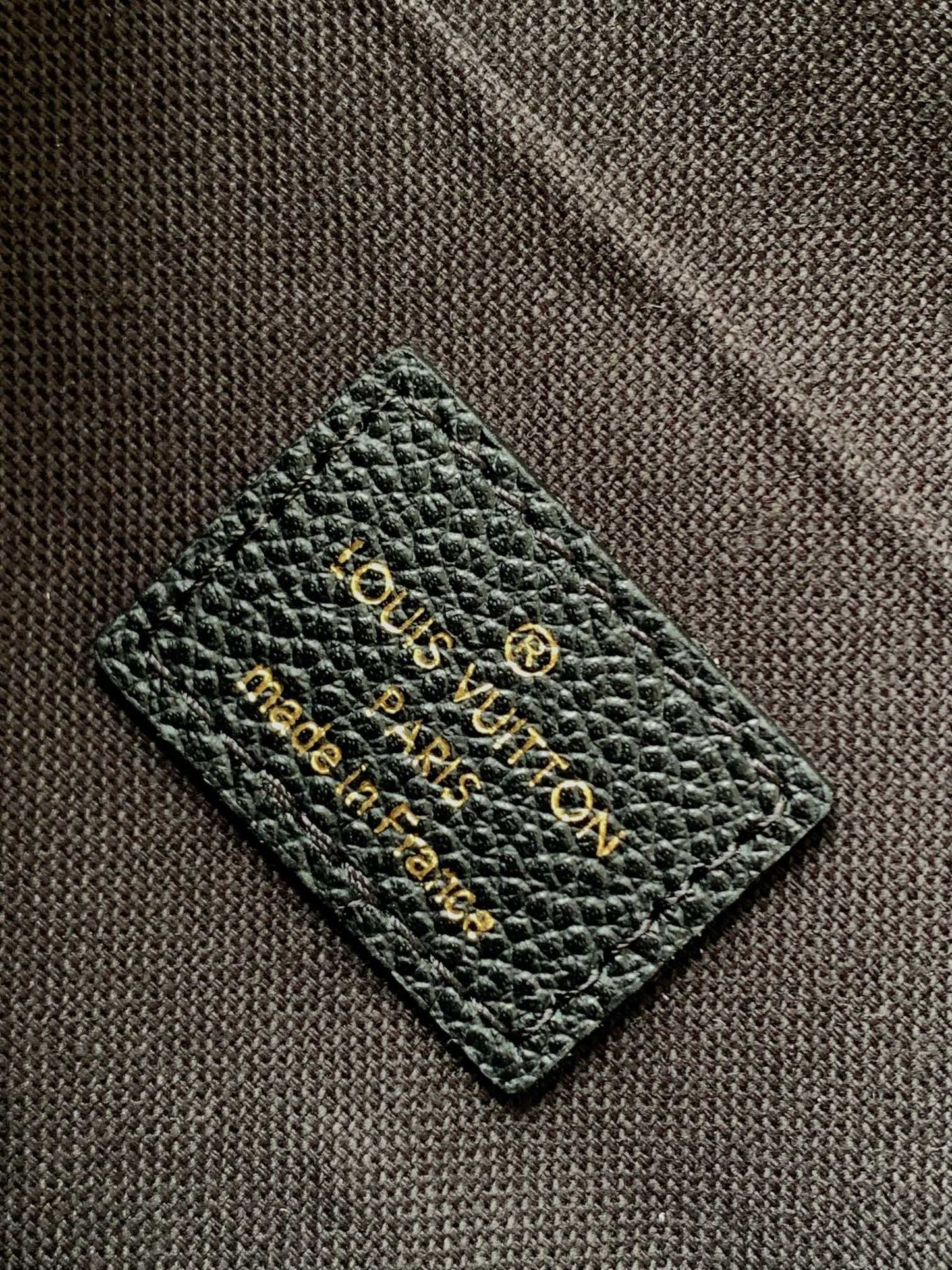 Louis Vuitton Elegant Black Chain Shoulder Bag with Gold Monogram Print