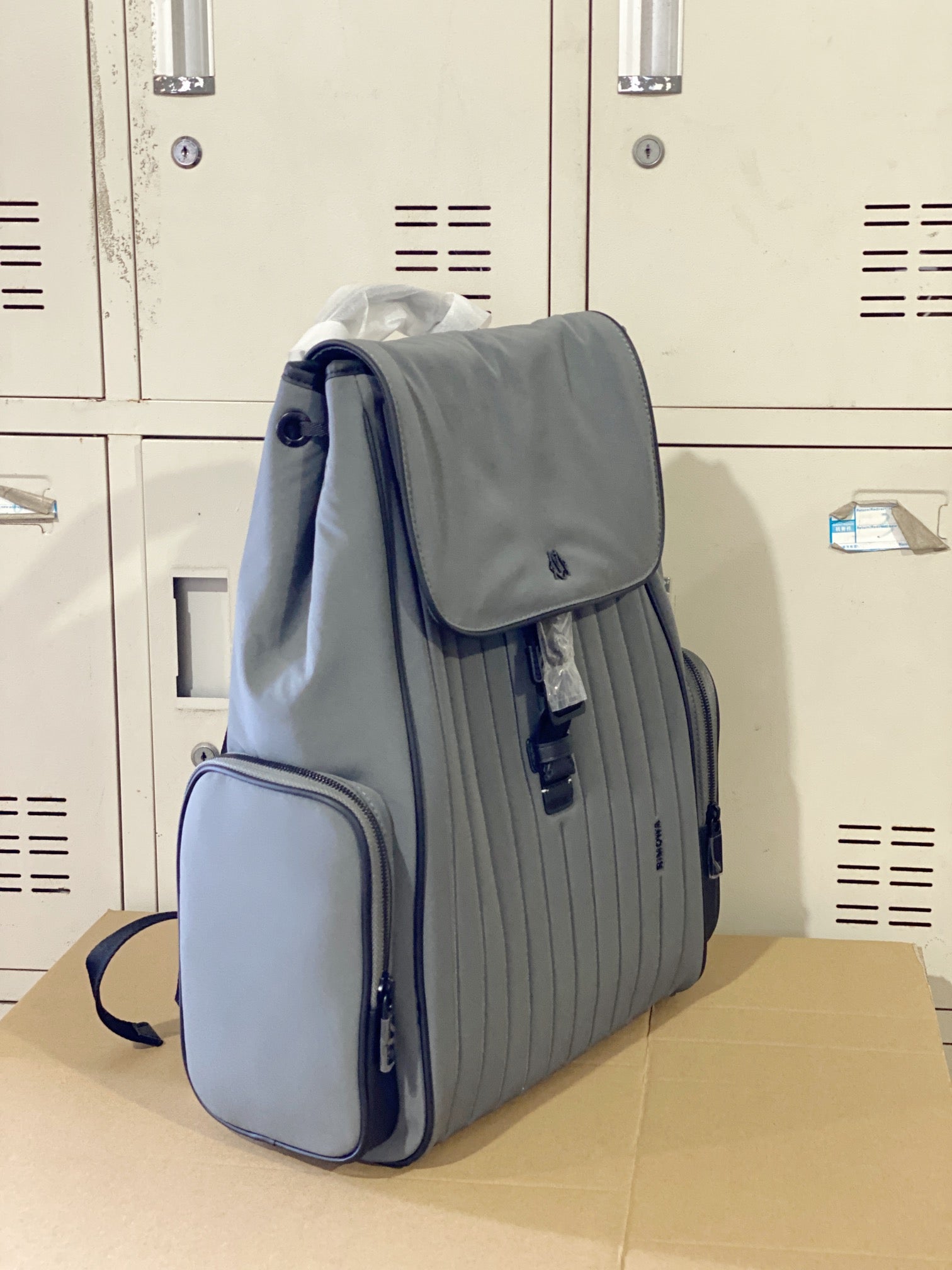 Grey Minimalist Flap Backpack with Ribbed Front Panel and Buckle