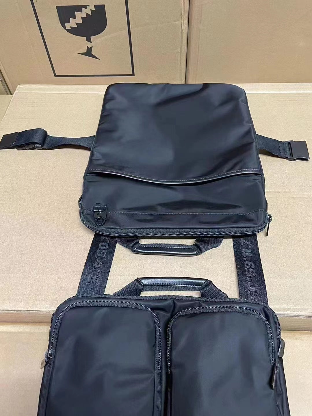 Minimalist Black Multi-Compartment Nylon Travel Backpack