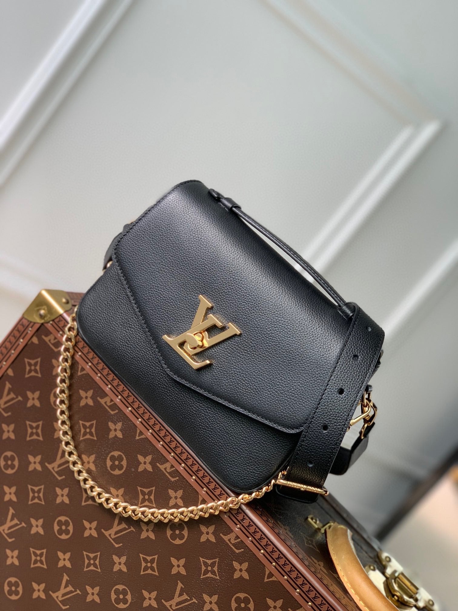 Elegant Black Crossbody Bag with Gold-Tone Hardware and Top Handle