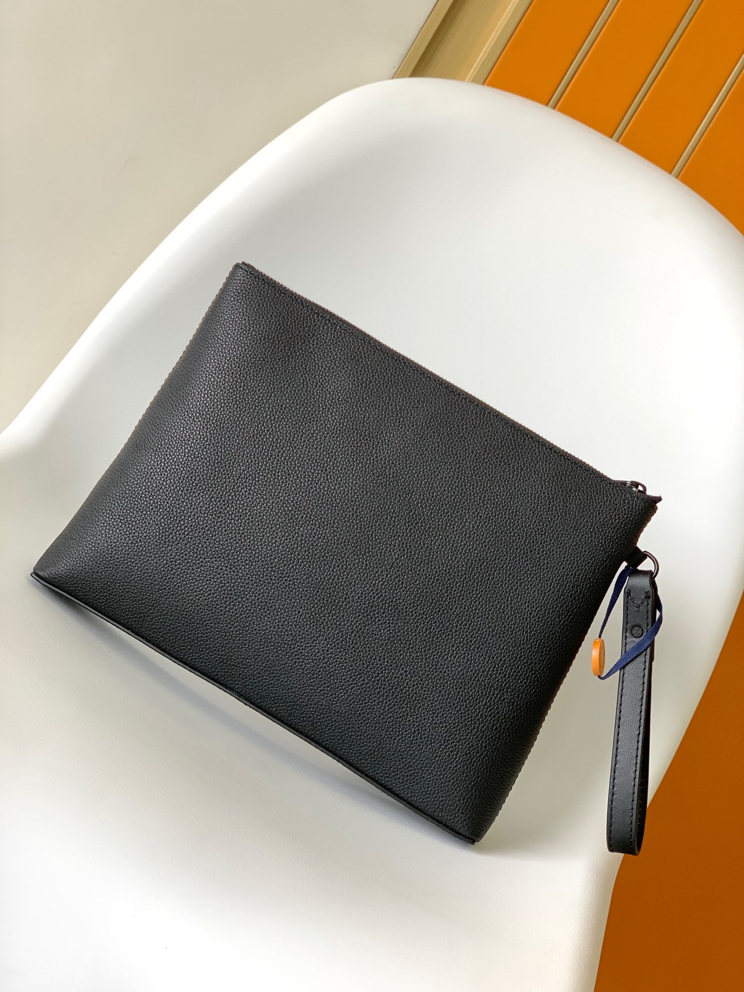 Louis Vuitton Black Textured Leather Clutch Bag with Wristlet Strap and Front Pocket