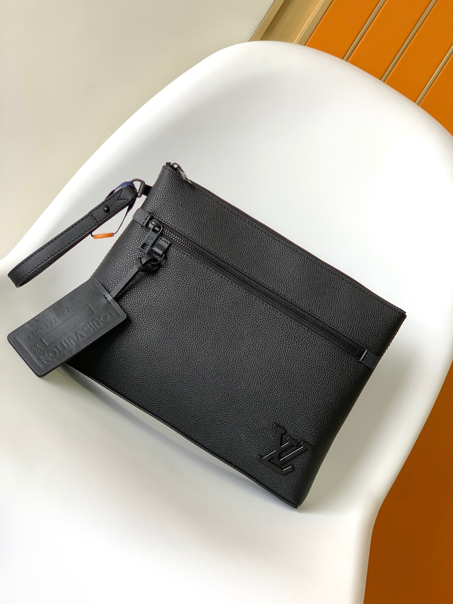 Louis Vuitton Black Textured Leather Clutch Bag with Wristlet Strap and Front Pocket