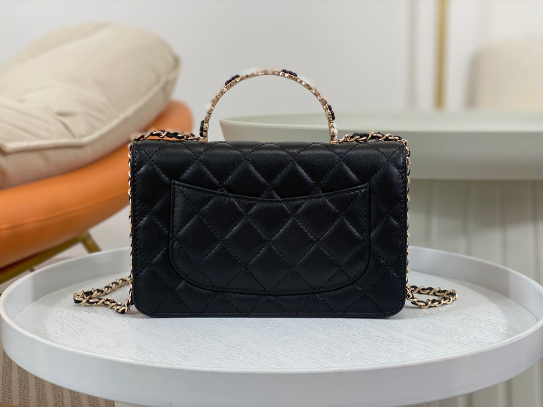 Chanel Black Quilted Leather Flap Bag with Top Handle and Gold Hardware