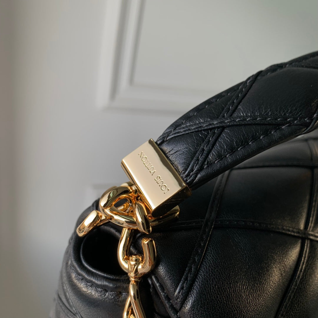 Louis Vuitton Quilted Black Leather Top Handle Handbag with Gold Metal Clasp