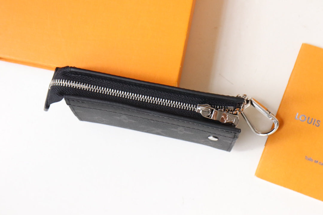 Louis Vuitton Black Embossed Pattern Leather Zip Around Wallet Clutch